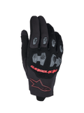 Alpinestars 2026 Pro-Dura Gloves, Motocross and Enduro Gloves, Black and Bright Red, featuring gray TPR knuckle and finger guards with a hexagonal pattern, breathable mesh backhand, red Alpinestars text, and a maroon star logo on the cuff