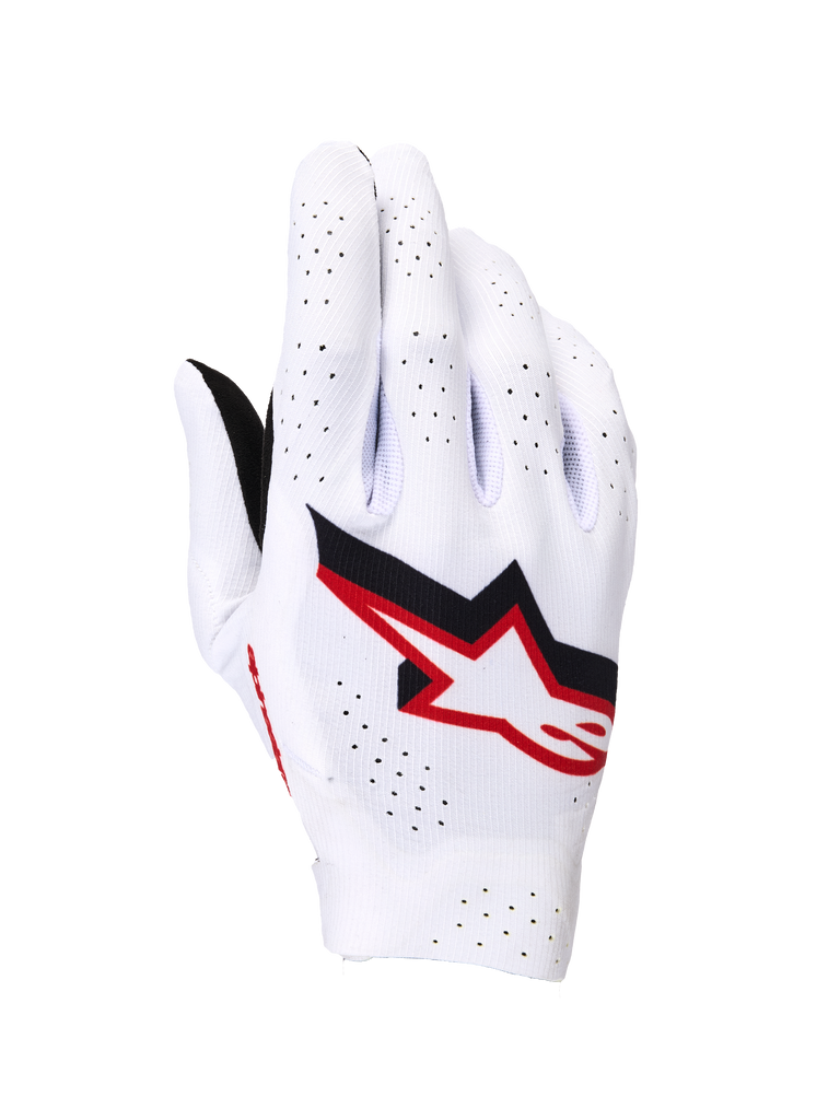 Alpinestars Supertech MX Gloves, Motocross Gloves, White with Black and Fire Red accents, backhand view featuring a bold Astar logo, extensive laser perforations for ventilation, and a lightweight seamless stretch construction for professional racing.