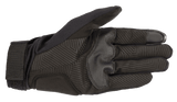 The Reef Glove by Alpinestars EU is a right black glove featuring "alpinestars" branding on the top, with a white logo near the wrist and a black-and-white checkered pattern along the lower edge. Made from stretch fabric, it boasts a synthetic suede palm and is touchscreen compatible, making it ideal for motorcycling or similar sports.