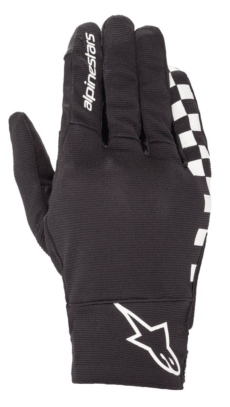 The Reef Glove by Alpinestars EU is a right black glove featuring "alpinestars" branding on the top, with a white logo near the wrist and a black-and-white checkered pattern along the lower edge. Made from stretch fabric, it boasts a synthetic suede palm and is touchscreen compatible, making it ideal for motorcycling or similar sports.