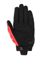 Alpinestars MM93 SP X 1 Handschuhe, Handflächenansicht, Schwarz und Fluo-Rot, Kunstleder-Konstruktion mit perforierter Handfläche, verstärkte Bereiche, TPR-Slider auf der Handfläche und Klettverschluss am Handgelenk mit Alpinestars-Logo.