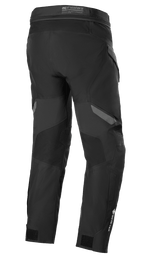 Alpinestars ST-7 2L GORE-TEX Hose, Schwarz und Dunkelgrau, Rückansicht, wasserdichte Adventure-Touring-Motorradhose mit verstärkten Einsätzen, GORE-TEX-Branding am Unterschenkel und verstellbaren Knöchelriemen