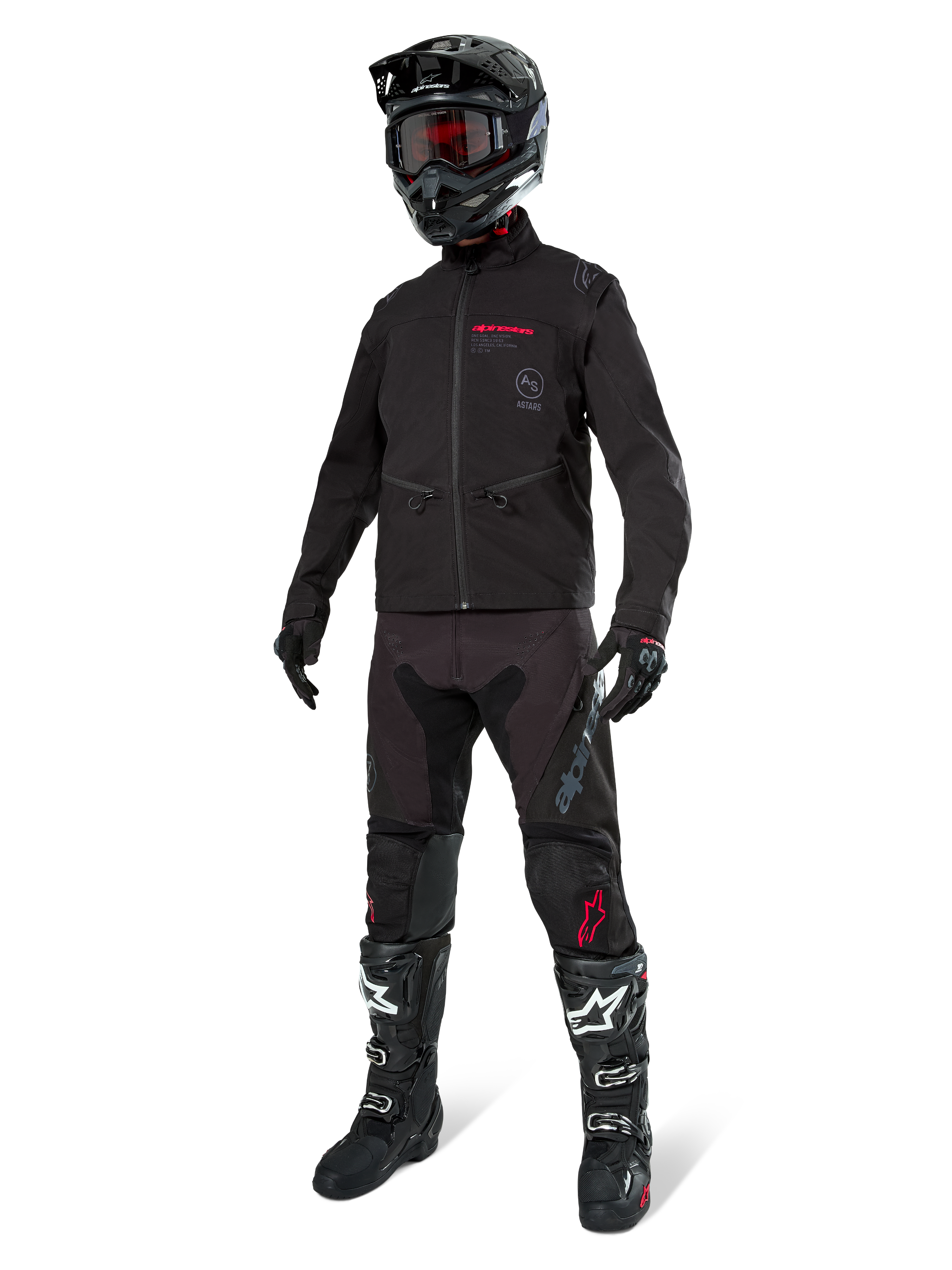 Alpinestars Lite-Dura Softshell Jacket, Black, worn by a mannequin as part of a complete off-road gear set including black pants, black and white boots, black helmet with red goggles, professional motocross and enduro apparel.