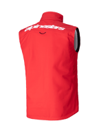 Alpinestars Techstar Softshell Vest, Motocross Vest, Bright Red, Rear view featuring white Alpinestars wordmark on the upper back, windproof stretch softshell material, ergonomic sleeveless design for off-road riding