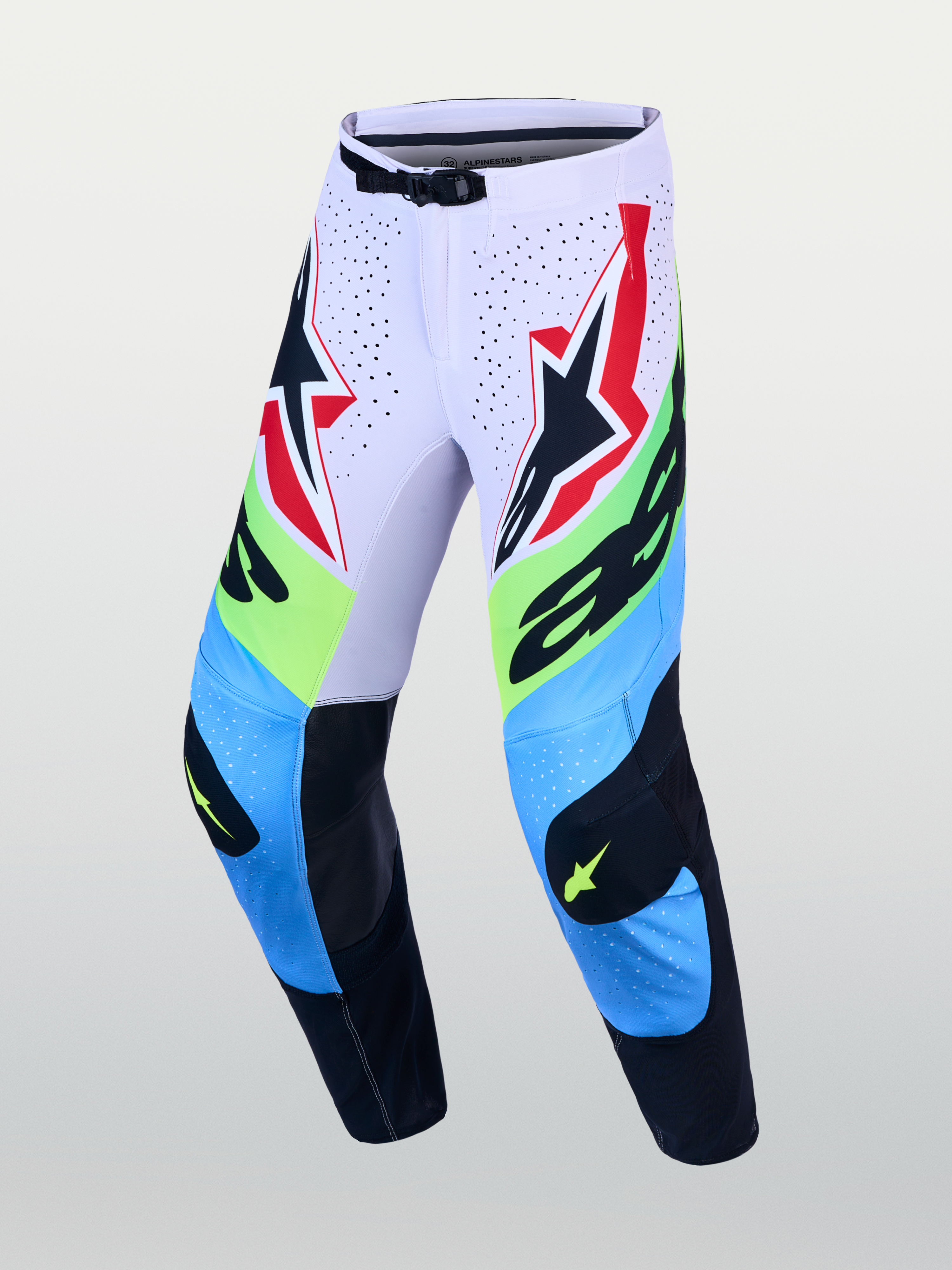 Alpinestars Supertech Dyna Hose, Motocross-Rennhose in Helllila und Neongrün mit schützenden Leder-Knieeinsätzen.
