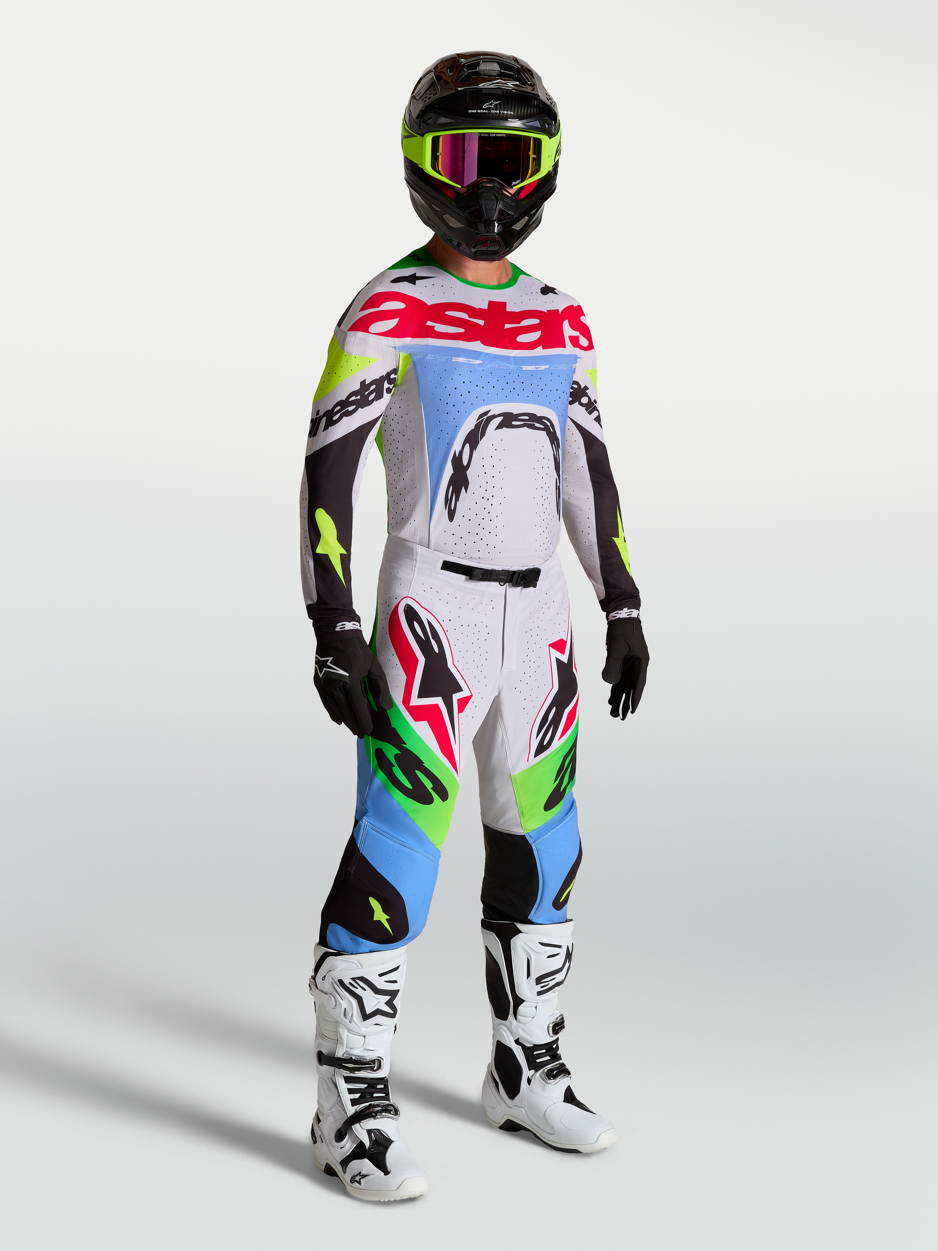 Alpinestars Supertech Dyna Hose, Herren-Motocross-Hose, Helllila und fluoreszierendes Grün, Teil einer kompletten Rennkombi.