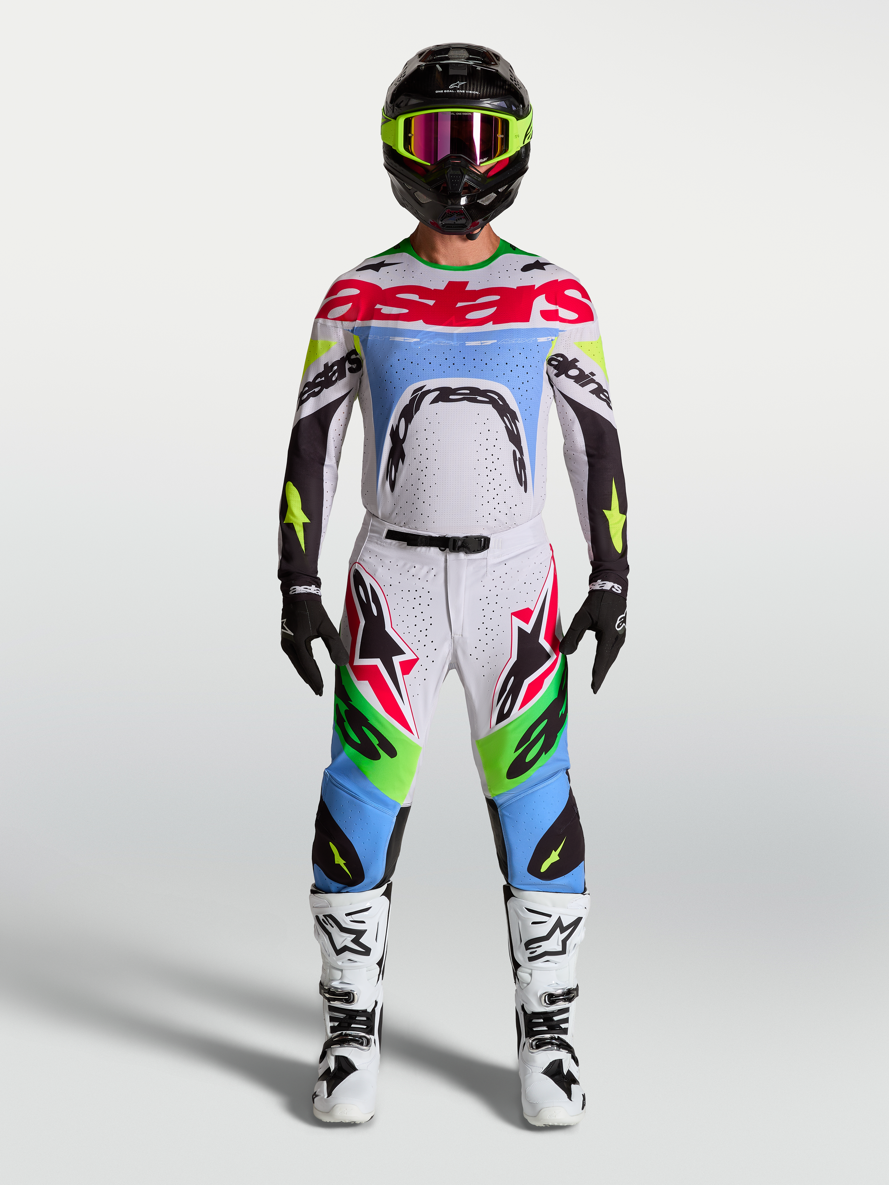 Alpinestars Supertech Dyna Hose, Motocross-Hose, Hell-Lila und Neongrün, aus Stretch-Ripstop-Gewebe mit Rennpassform.