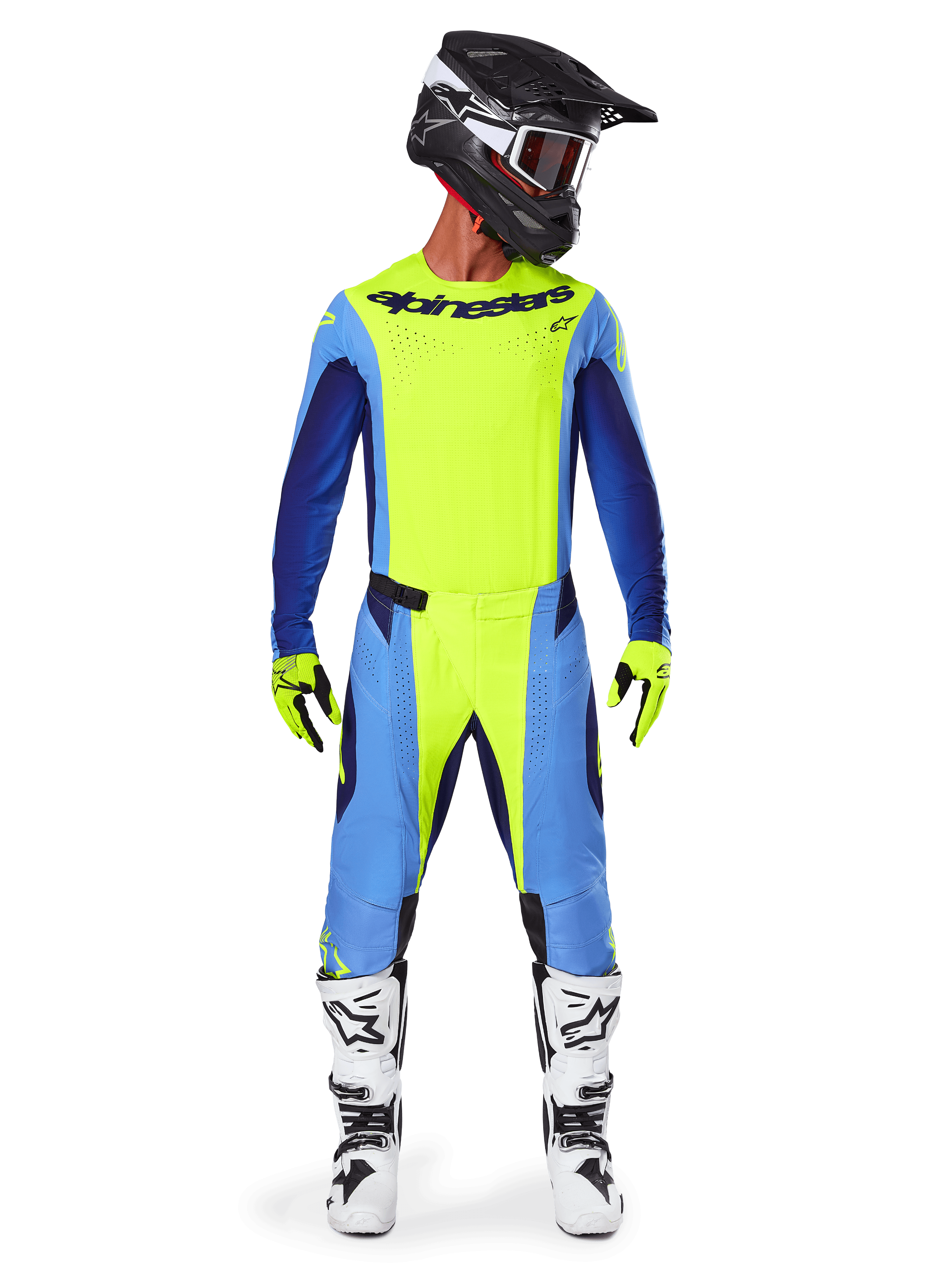 Motocross rider wearing the Alpinestars 2025 Techstar Melt Gear Set, Bright Yellow Fluo jersey with blue and navy sleeves, matching yellow and blue pants, black and white helmet with goggles, white and black boots, yellow and black gloves, coordinated outfit for off-road racing