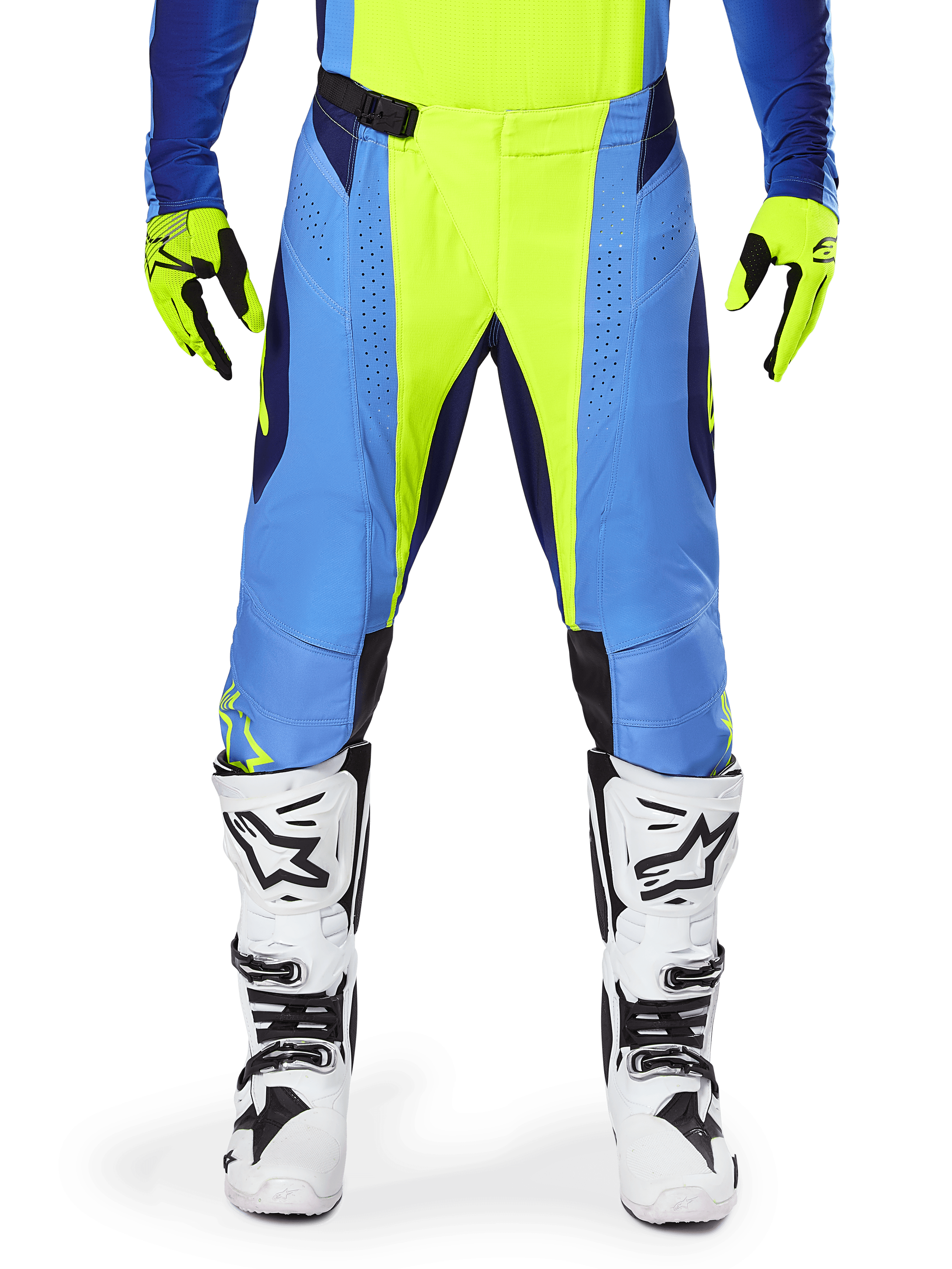 Alpinestars 2025 Techstar Melt Pants, Motocross Pants, Yellow Fluo Blue, worn with matching jersey, yellow gloves, and white and black boots, featuring a multi-panel design with laser-cut perforations and a magnetic waist buckle for professional off-road racing.