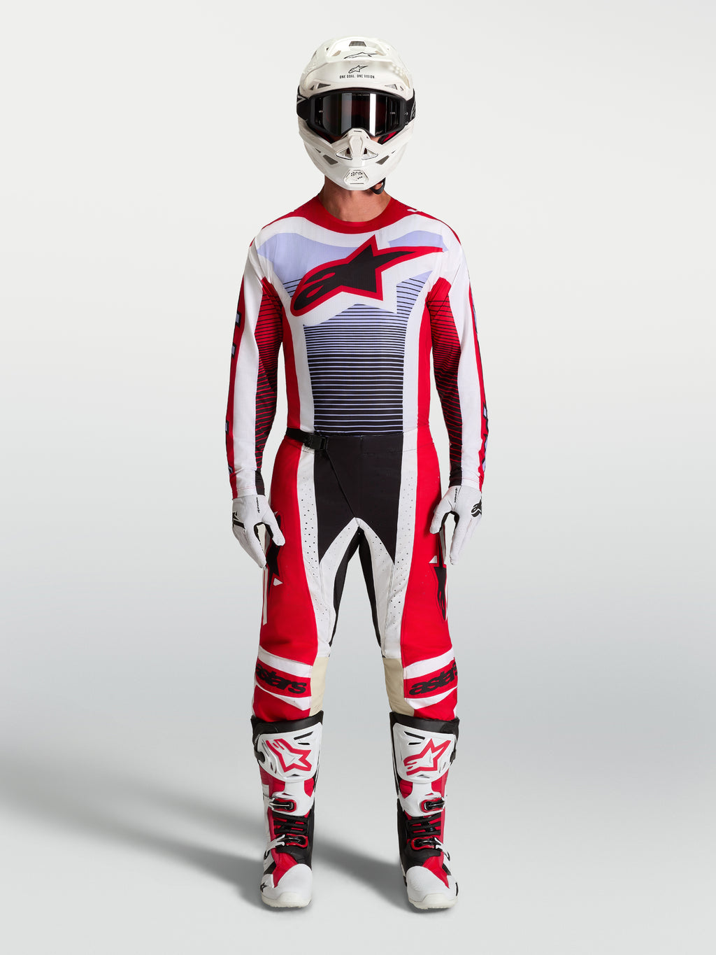 Alpinestars Techstar Maven Hose und Motocross-Set für Herren in Feuerrot und Weiß mit Lavendel-Akzenten und Stiefeln.