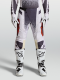 Alpinestars Techstar Swan Hose, Motocross-Hose in Lila und Dunkelgrau mit roten Akzenten und Magnetschnalle.