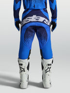 Alpinestars Techstar Swan Hose für Herren in Blau und Dunkelblau, Motocross-Ausrüstung mit großem Logo am Gesäß und verstärktem Sitzbereich.