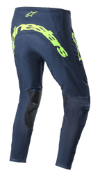 Alpinestars 2023 Supertech Bruin Hose, Motocross-Hose, Night Navy und Yellow Fluo, Rückansicht mit großem neongelben Alpinestars-Branding auf dem Gesäß, perforierten Belüftungszonen und schwarzen Verstärkungen an der Beininnenseite