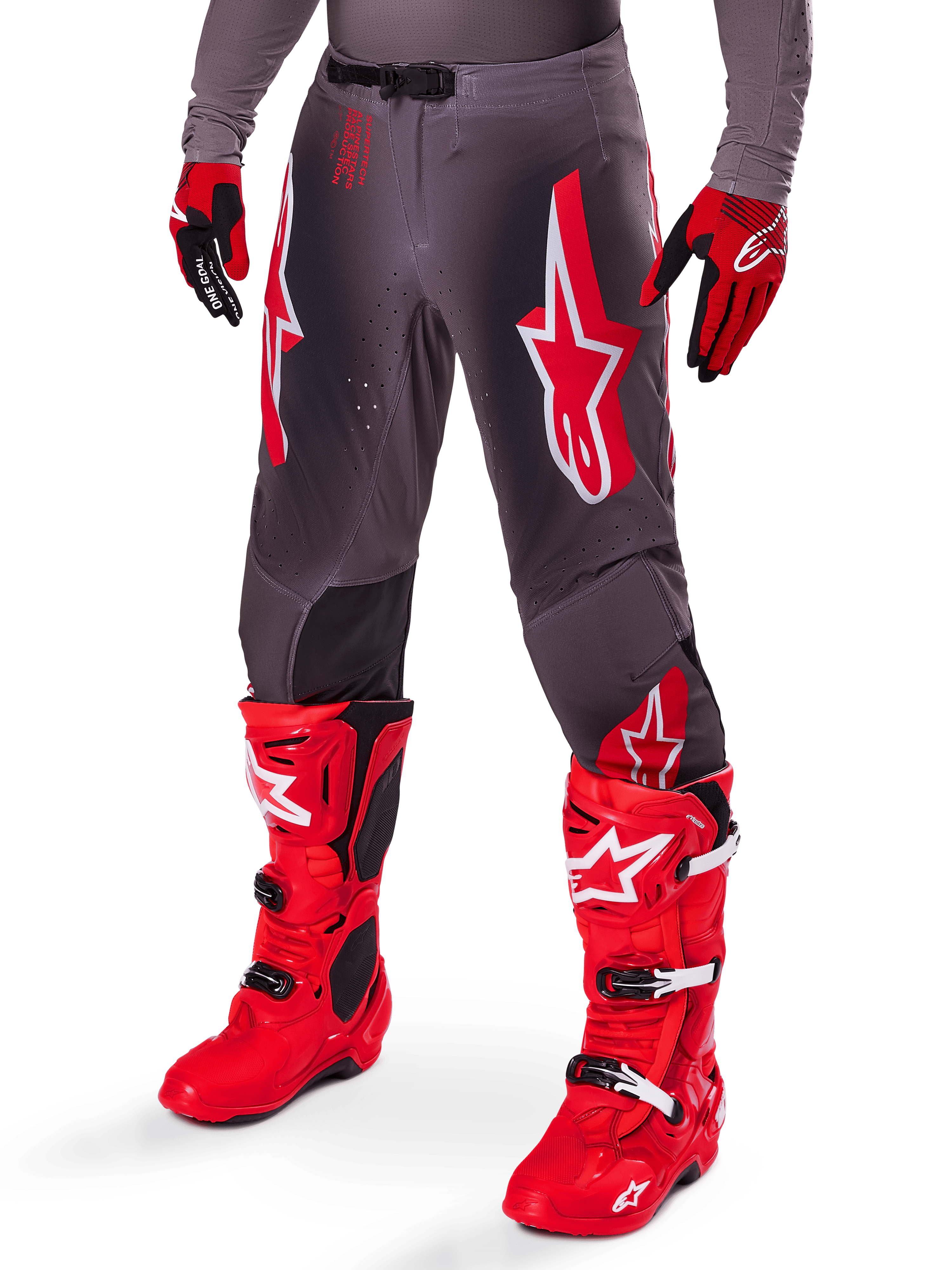 Alpinestars 2025 Supertech Lipan Ausrüstungsset, graue Motocross-Hose mit markanten roten und weißen Stern-Logos, kombiniert mit leuchtend roten Performance-Stiefeln und rot-schwarzen Handschuhen, entwickelt für den Profi-Rennsport