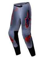 Alpinestars 2025 Supertech Lipan Hose, Motocross-Hose, Grau und Orange Fluo, mit leuchtend orangefarbenen und marineblauen Stern-Logos auf den Oberschenkeln und Knien, schwarzen Einsätzen an der Beininnenseite und verstellbarem Bund, entwickelt für Pro-Level Offroad-Performance.