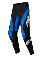 Alpinestars 2025 Techstar Dreem Hose, Motocross-Hose, Schwarz und Blau mit weißen Alpinestars-Logos, markante eckige blaue Paneele auf schwarzer Basis, athletisches Design mit verstärkten Kniebereichen für Offroad-Performance.