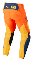 Alpinestars Techstar Factory Hose, Motocross-Hose, Orange, Dunkelblau und Warmes Gelb, Rückansicht mit gelbem ASTARS-Logo auf dunkelblauem Rückeneinsatz, leuchtend orangefarbenes Hauptteil mit atmungsaktivem gelbem Mesh an den Unterschenkeln und blauen Akzenten