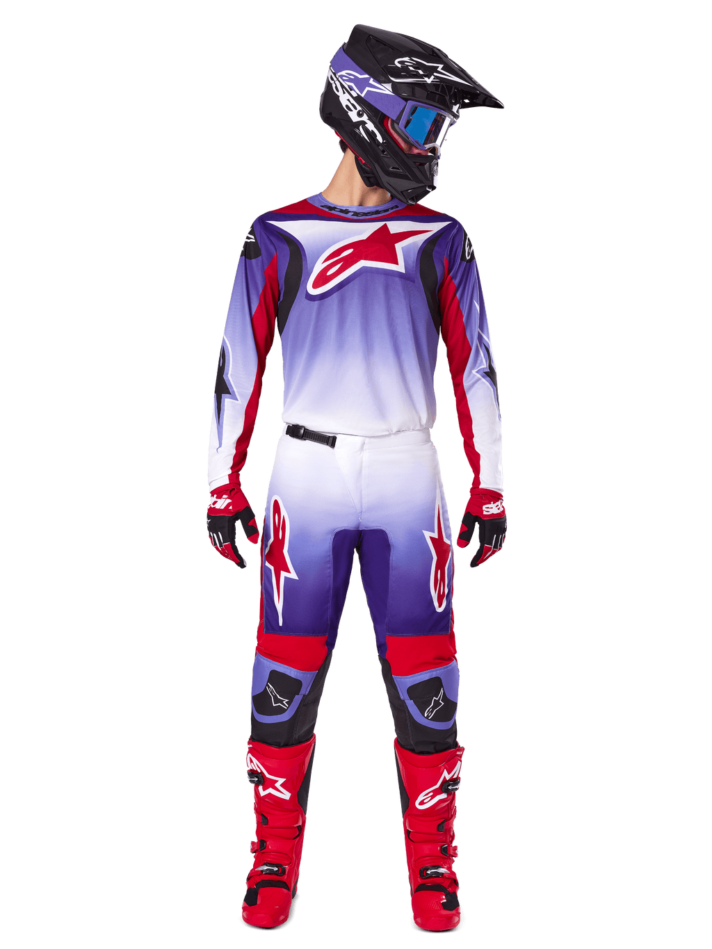 Alpinestars 2025 Fluid Wurx Gear Set, Motocross-Fahrer in lila, weißem und leuchtend rotem Trikot und Hose, schwarzer Helm mit blauer Brille, rote Motocross-Stiefel und passende Handschuhe, sportliches Renndesign für Offroad-Performance