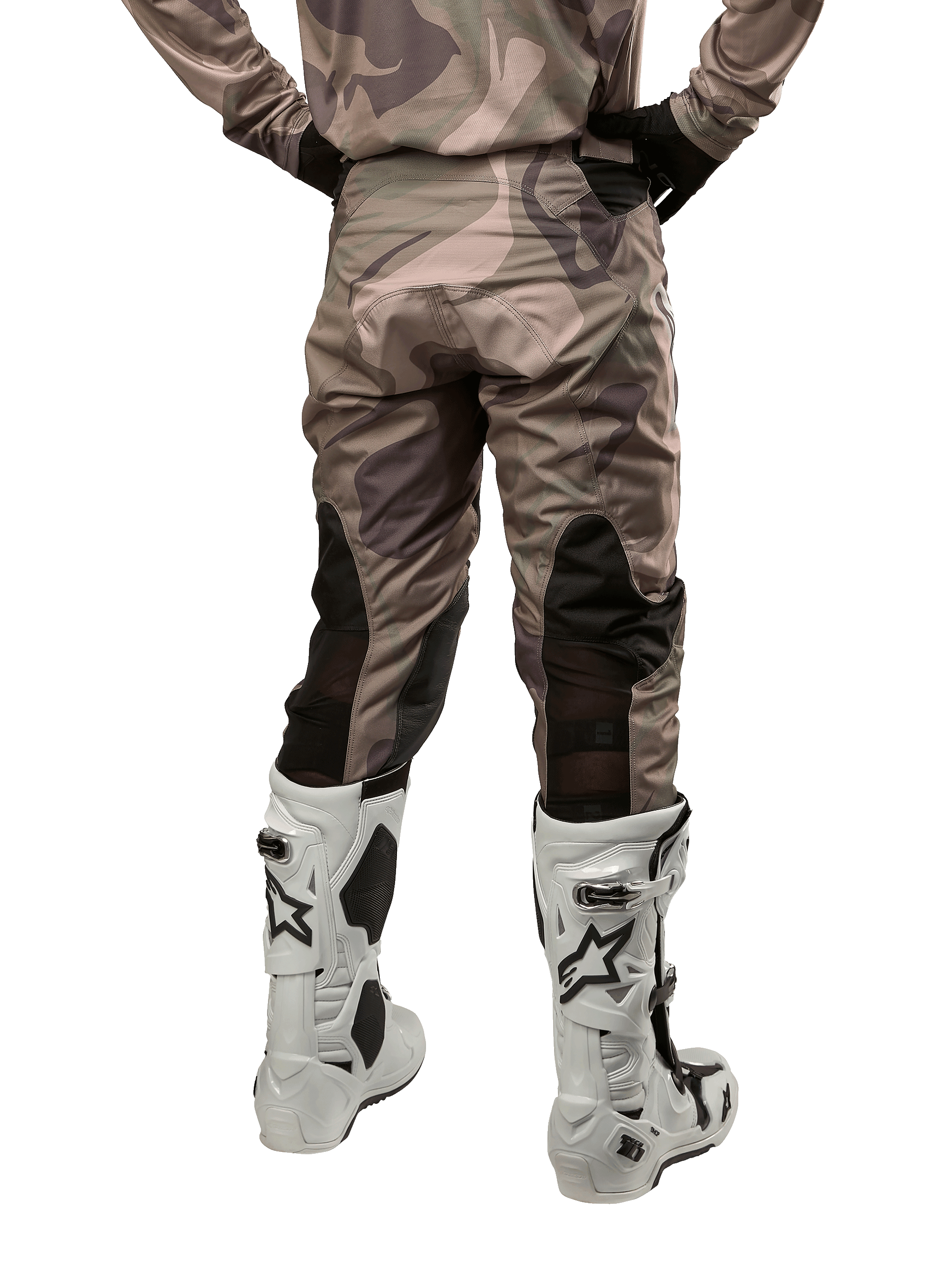 Alpinestars 2024 Racer Tactical Pants, Motocross Pants, Military Green Camo Brown, back view showing camouflage pattern and black breathable stretch panels on the lower legs, worn with white motocross boots, durable technical gear for off-road riding