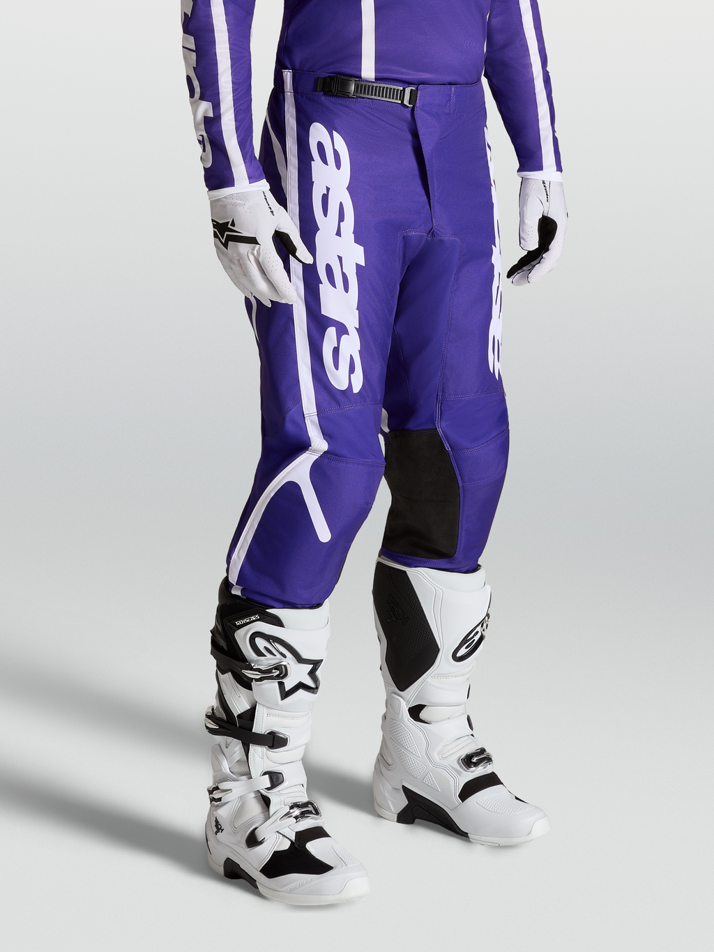 Alpinestars Fluid Apex V2 Pants, Men's Motocross Gear in Deep Blue and White, with durable 600D polyfabric and pre-curved legs.