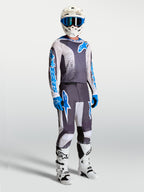 Alpinestars Fluid Drag Motocross-Hose und Trikot in Grau und Blau, ergonomisches 3D-Design für Performance.