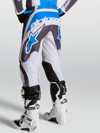 Alpinestars Fluid Drag Hosen, Motocross-Hosen für Herren, Grau und Blau, Rückansicht mit ergonomischer 3D-Musterkonstruktion.