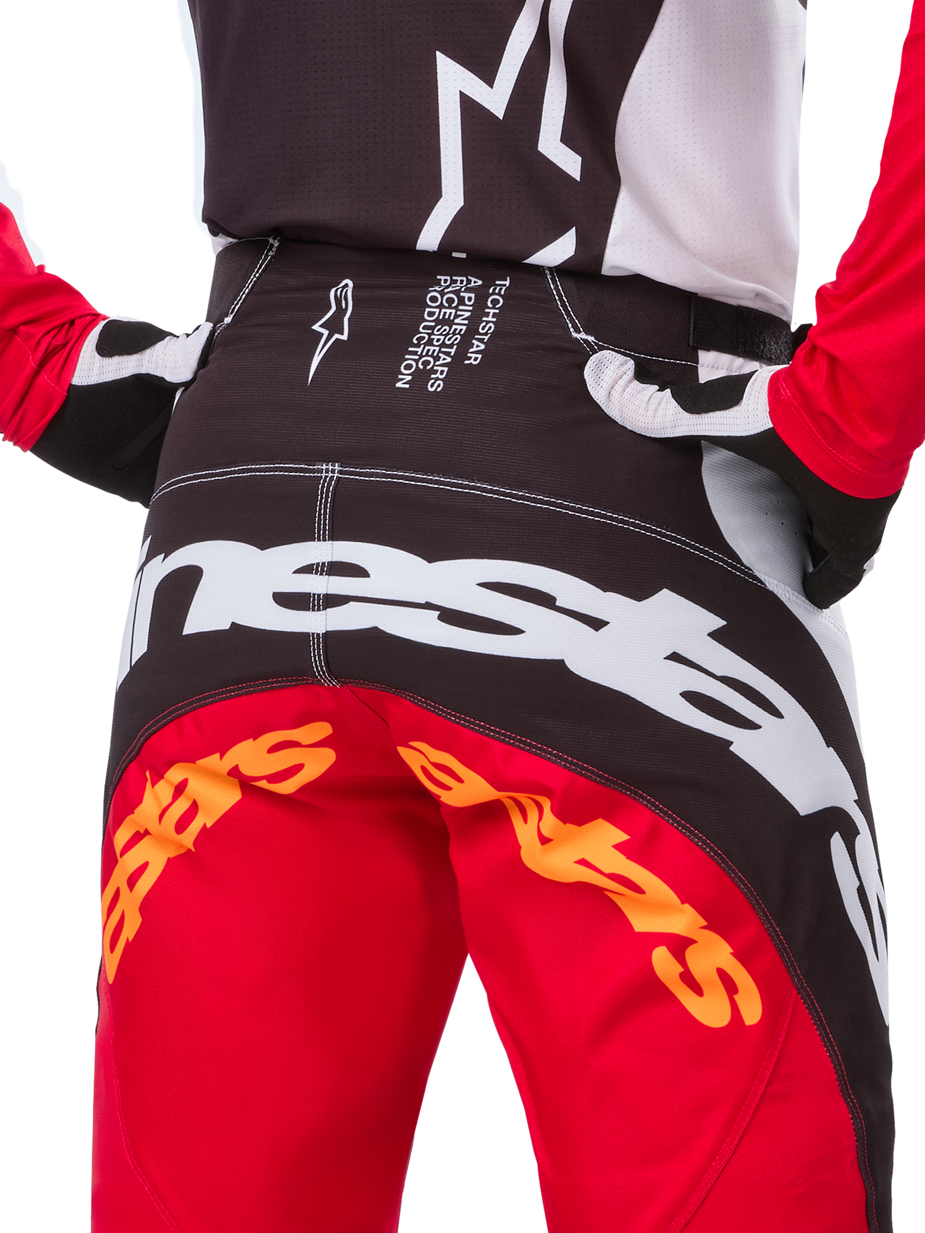 Alpinestars Limited Edition Techstar Deep Hose, Motocross-Hose, Schwarz, Weiß und High Red, mit einem Multi-Panel-Design, verstärkten Knien und 4-Wege-Stretch-Einsätzen für erstklassige Offroad-Performance.