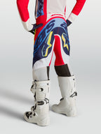 Alpinestars Jugend Supertech Dyna Hose, Motocross-Hose für junge Fahrer in Rot und Marineblau, in der Rückansicht gezeigt.