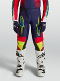 Alpinestars Youth Fluid Drag Pants for Motocross Racing, Blue Navy and Fire Red with Neon Yellow Graphics.
