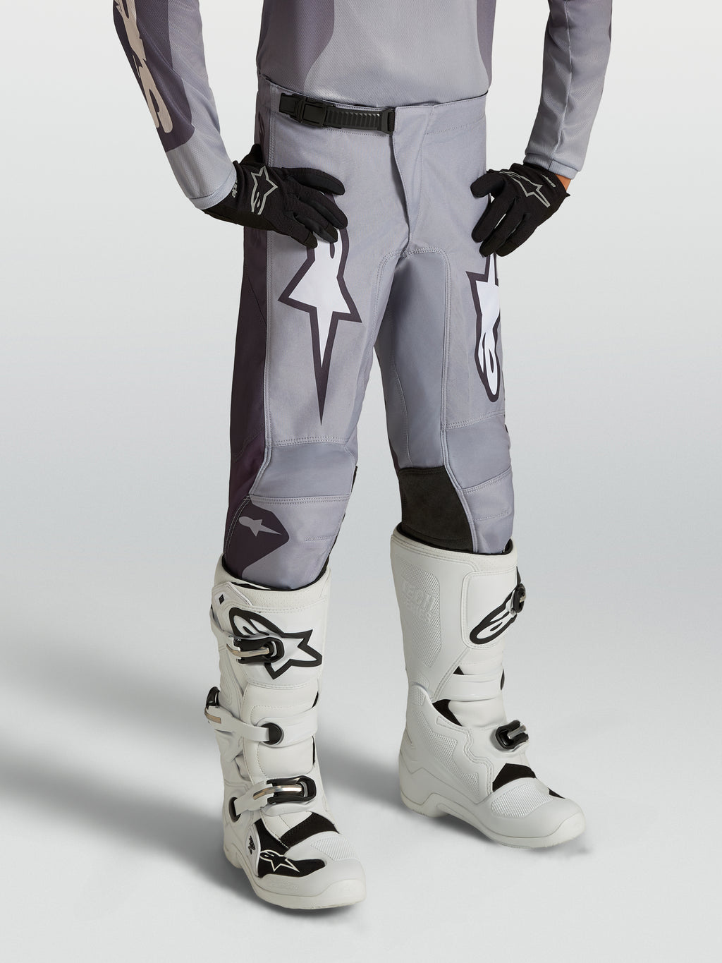 Alpinestars Youth Fluid Amber Pants, sand gray youth motocross pants with white star graphics and reinforced panels.