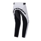 Alpinestars 2024 Youth Racer Lucent Pants, Motocross Pants, White and Black, rear view showing large black reinforced panels on the seat and inner legs, Alpinestars wordmark across the back, and adjustable waist straps for off-road riding.
