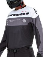 Alpinestars Pro-Dura Jersey, Motocross and Enduro Jersey, Black Magnet White, technical off-road apparel with laser-cut perforations and breathable poly-fabric construction.