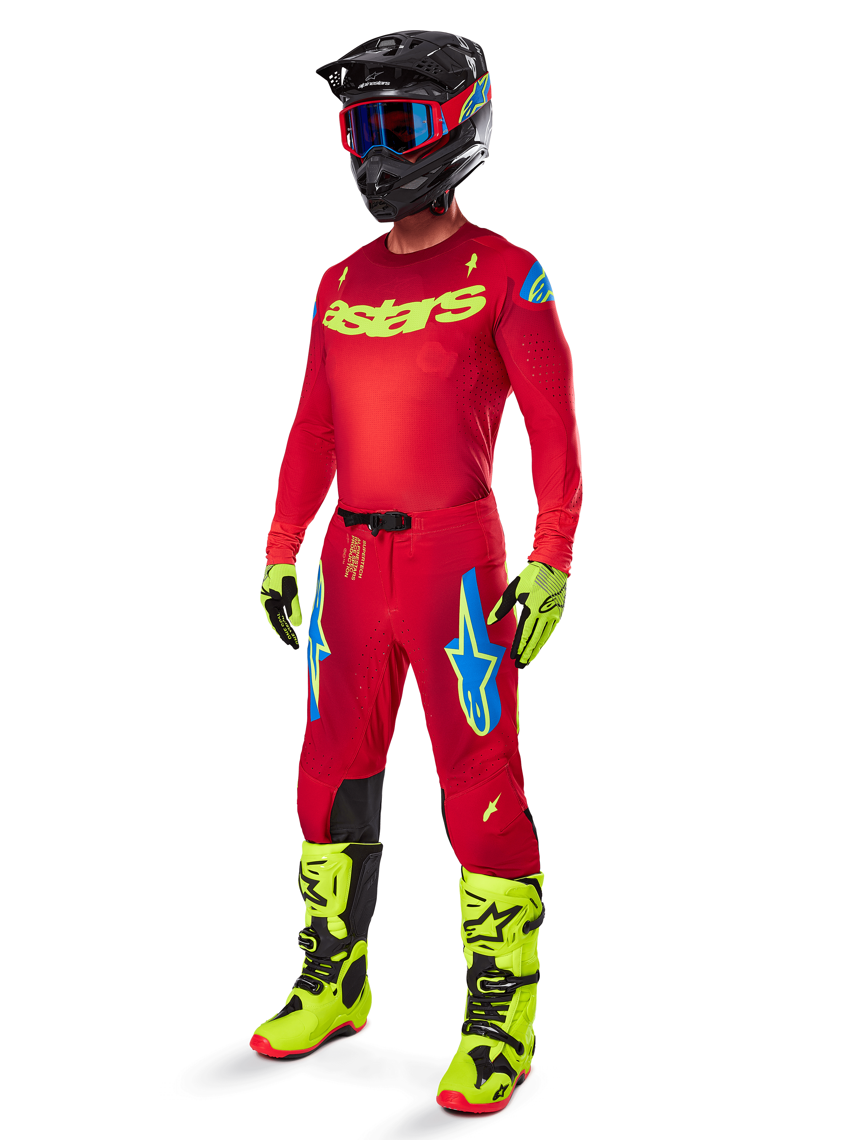 Alpinestars 2025 Supertech Maker Gear Set, complete motocross racing outfit, red jersey and pants with yellow and blue accents, neon yellow boots and gloves, black helmet with blue goggles, professional high-performance gear for off-road racing