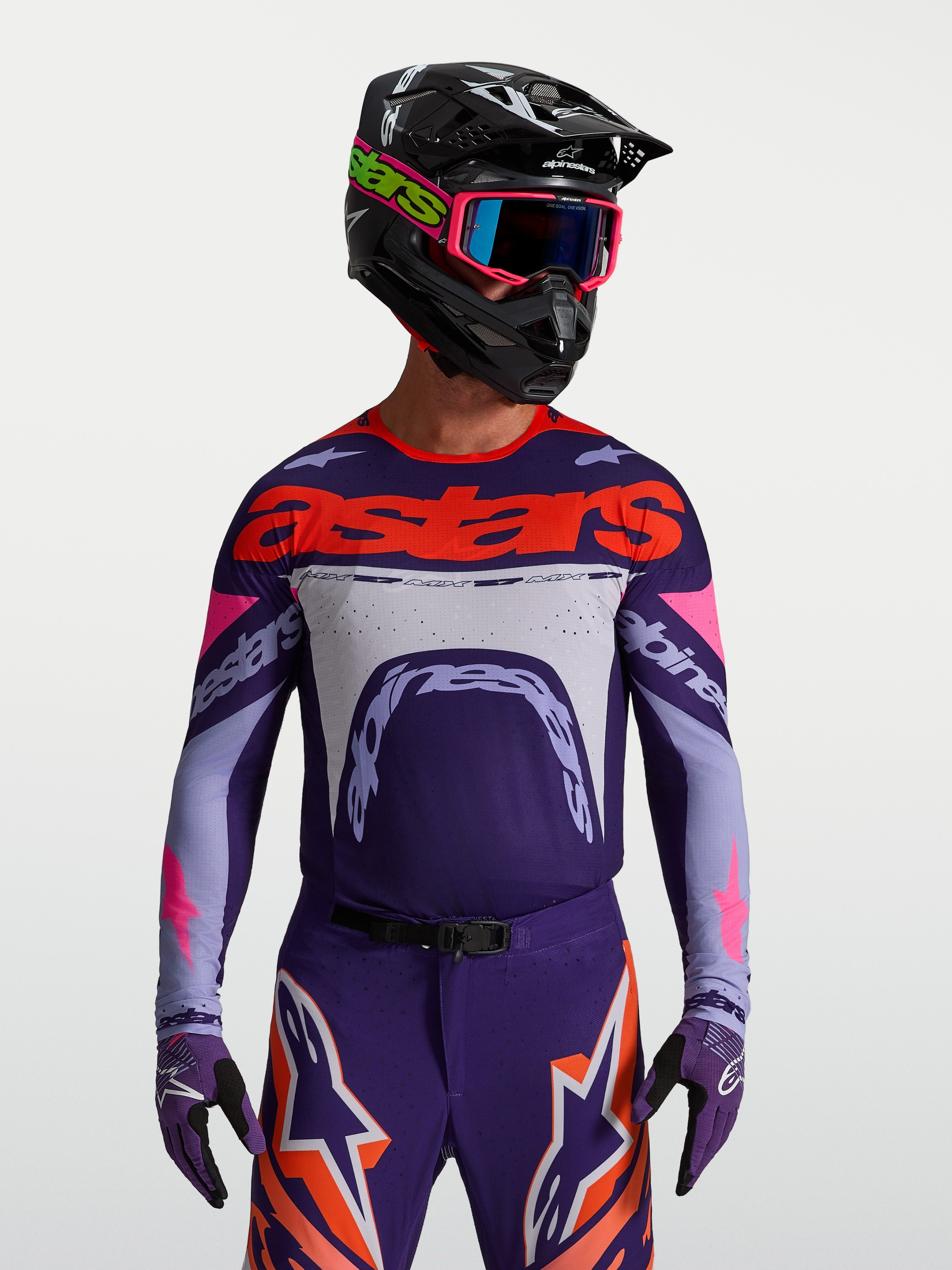 Alpinestars Supertech Dyna Trikot, lila und pink fluo Motocross-Oberteil, athletische Passform aus Stretch-Mesh.