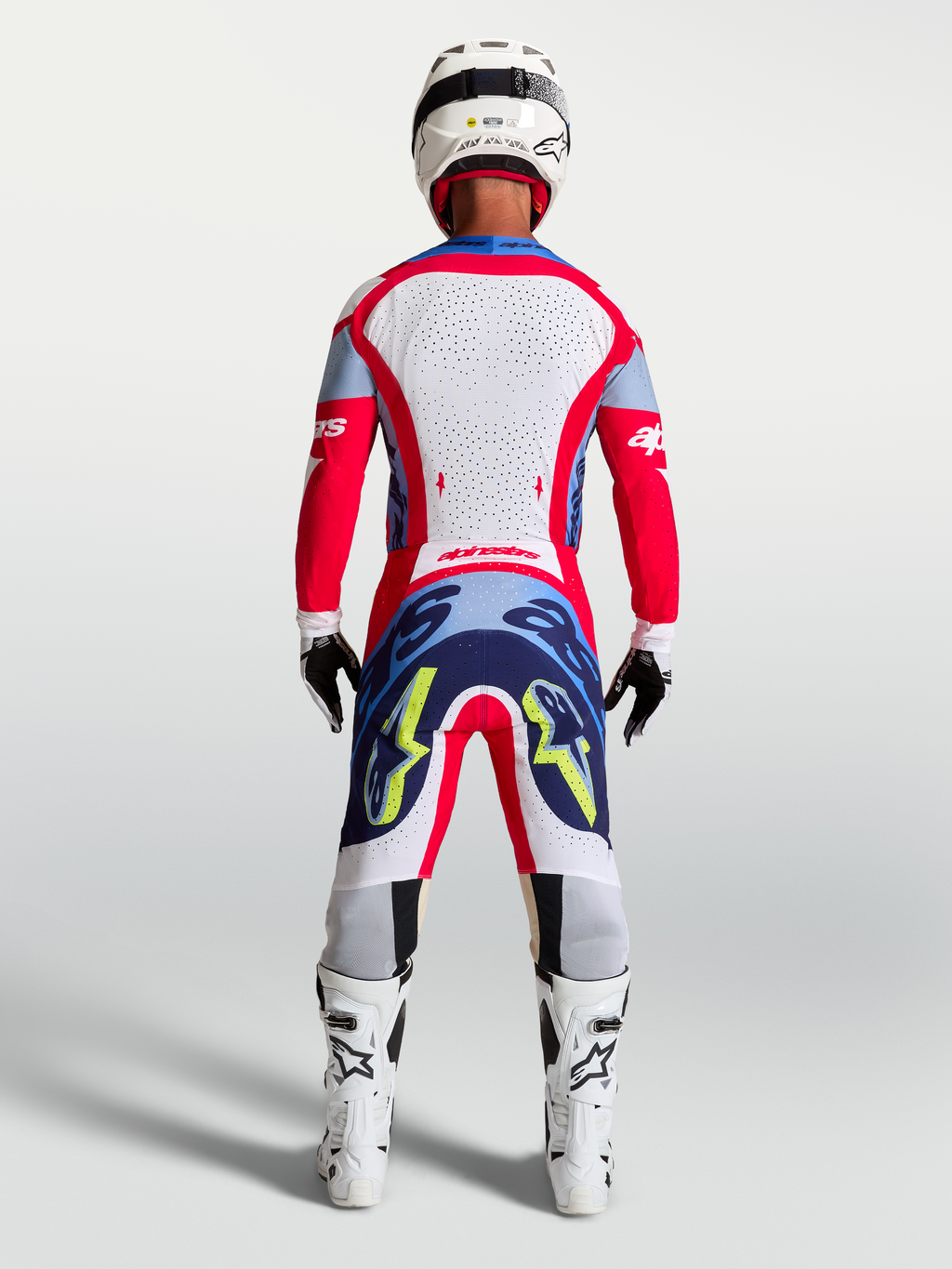 Alpinestars Supertech Dyna Trikot und 2027 Supertech Dyna Gear Set, Herren-Motocross-Outfit in Rot und Weiß, Rückansicht.