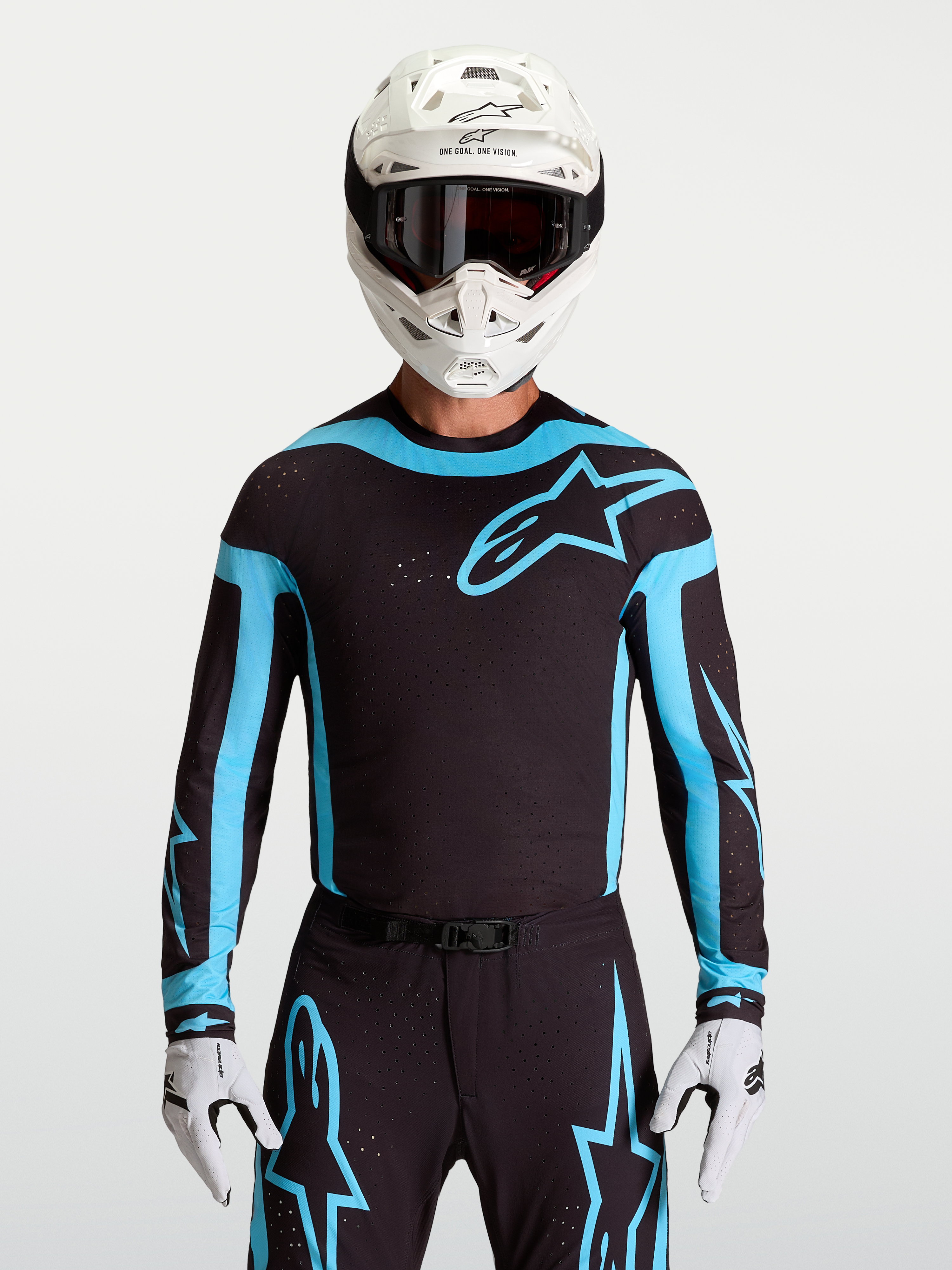 Alpinestars Supertech Vesta Trikot, Motocross-Oberteil für Herren, Schwarz und Türkis, atmungsaktiv mit Laser-Perforationen.