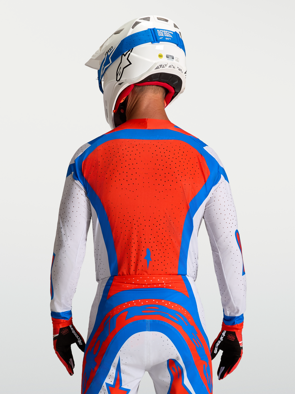 Alpinestars Supertech Vesta Trikot in Rot und Weiß, mit belüftetem Mesh-Rücken für professionellen Motocross-Sport.