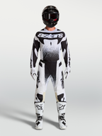 Alpinestars Techstar Swan Trikot und Gear Set, Herren-Motocross-Outfit, Schwarz und Weiß mit punktierten Grafiken.