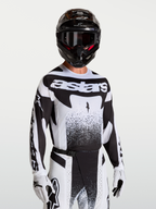 Alpinestars Techstar Swan Trikot, Herren-Motocross-Trikot in Schwarz und Weiß, athletische Passform mit Laser-Belüftung.