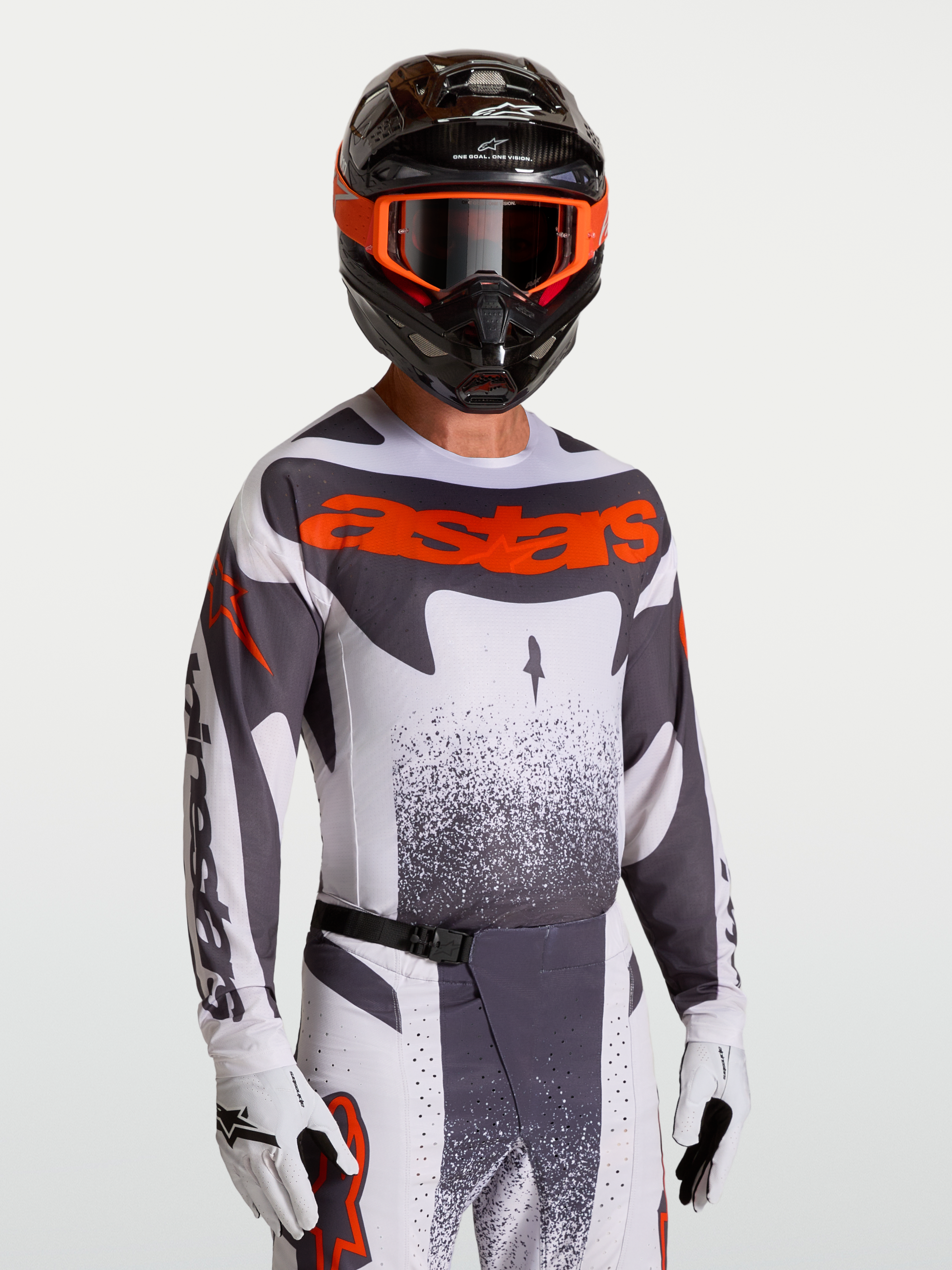 Alpinestars Techstar Swan Trikot, Motocross-Oberteil in Grau und Rot Fluo, mit Race-Fit und lasergeschnittener Belüftung.