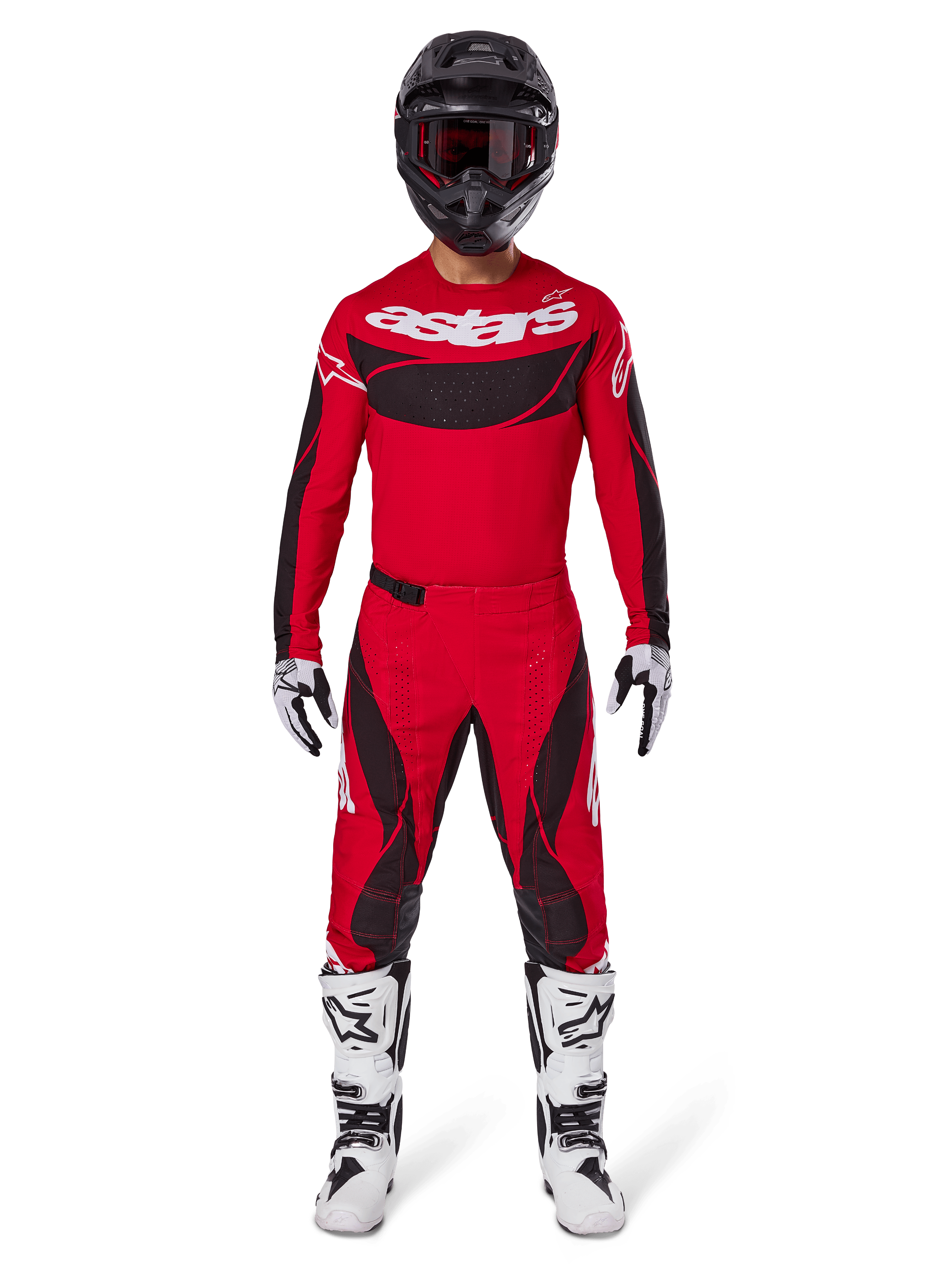 Motocross rider wearing the Alpinestars 2025 Techstar Dreem Gear Set, Bright Red jersey with black panels and white 'astars' branding, matching red and black pants, black helmet, white and black boots and gloves, complete outfit for off-road competition