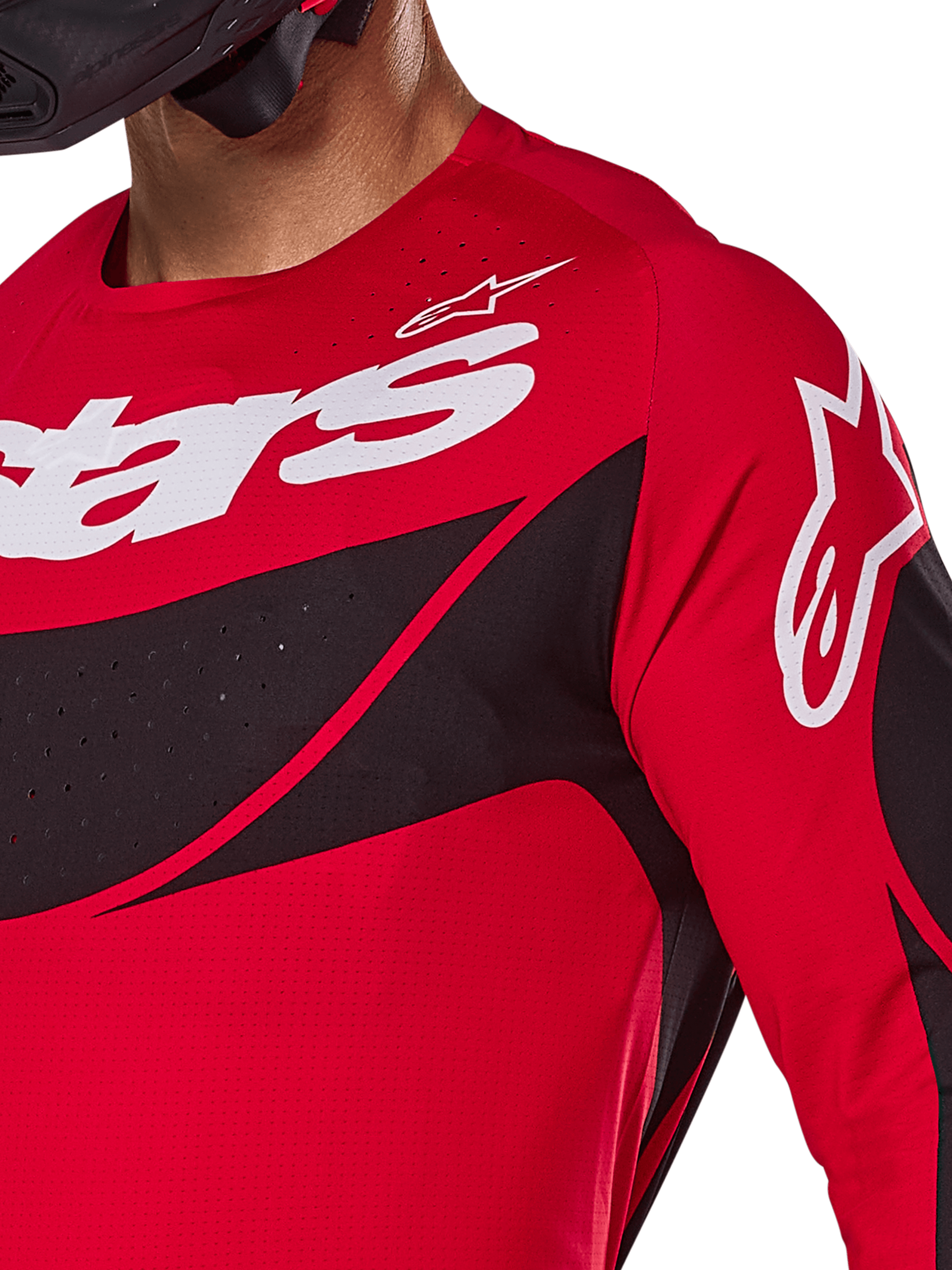 Alpinestars 2025 Techstar Dreem Jersey, Motocross Jersey, Bright Red and Black, close-up view of chest and shoulder featuring white branding, black diagonal panels with laser-cut perforations for ventilation, athletic racing fit for off-road performance.