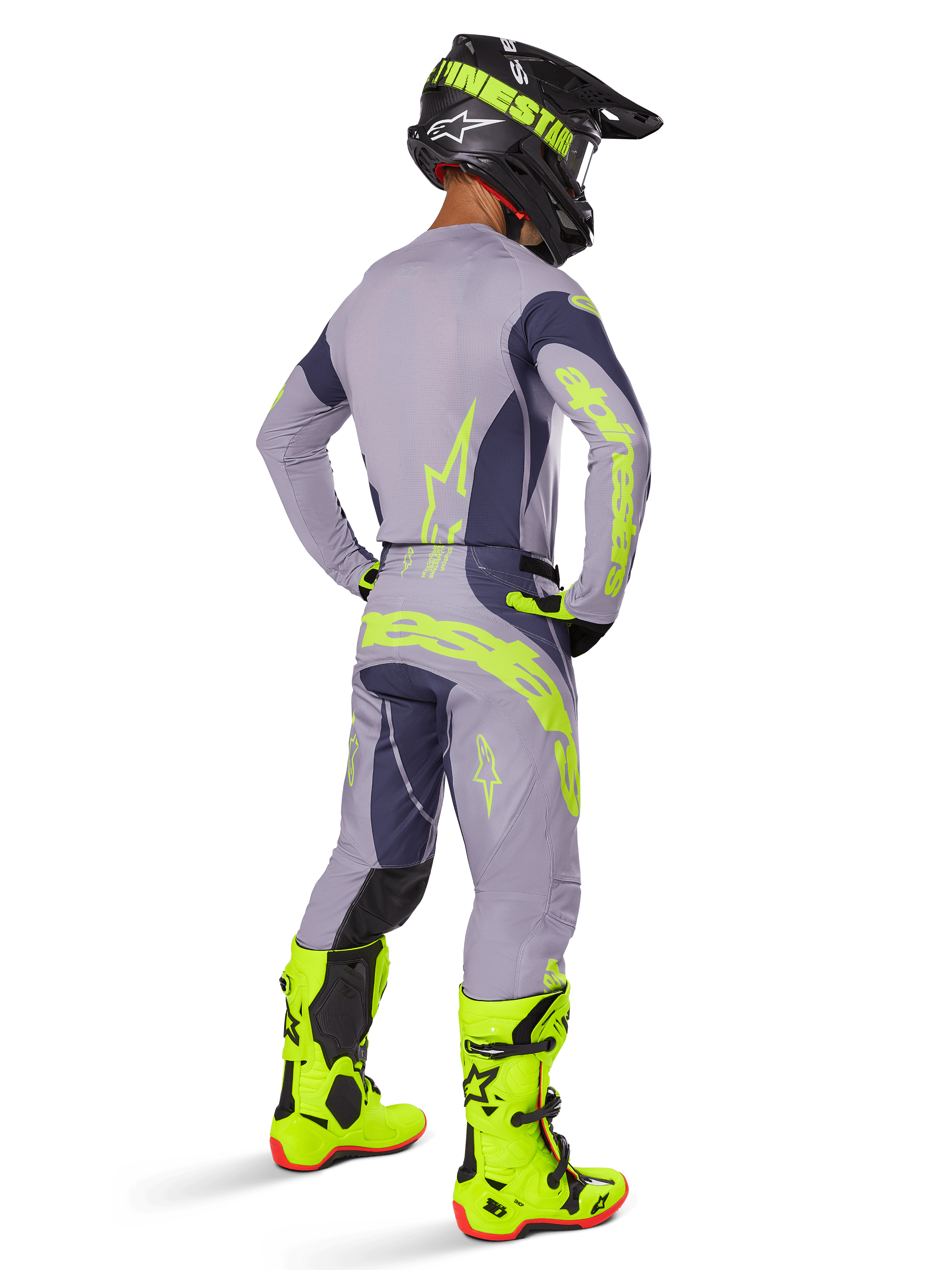 Alpinestars 2025 Techstar Dreem Jersey, Motocross Jersey, Gray and Dark Gray, worn with matching pants and bright neon yellow boots, back view showing neon yellow branding and athletic fit for off-road racing