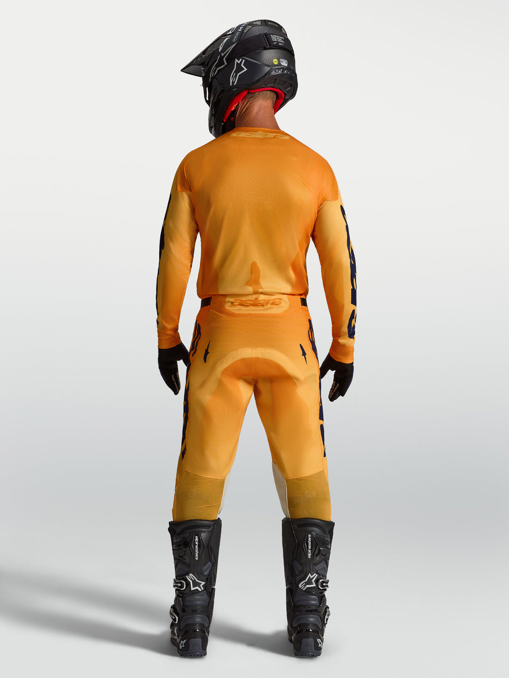 Alpinestars 2027 Racer Amber Trikot und Ausrüstungsset, Herren-Motocross-Outfit, Orange und Dunkelblau, Rückansicht.