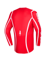 Alpinestars 2026 Fluid Apex Trikot, Rot und Weiß, Rückansicht des langärmeligen Motocross-Trikots mit weißen geschwungenen Akzentlinien, Stern-Logo unten und weißem Alpinestars-Schriftzug auf den Ärmeln, konzipiert für den Offroad-Rennsport