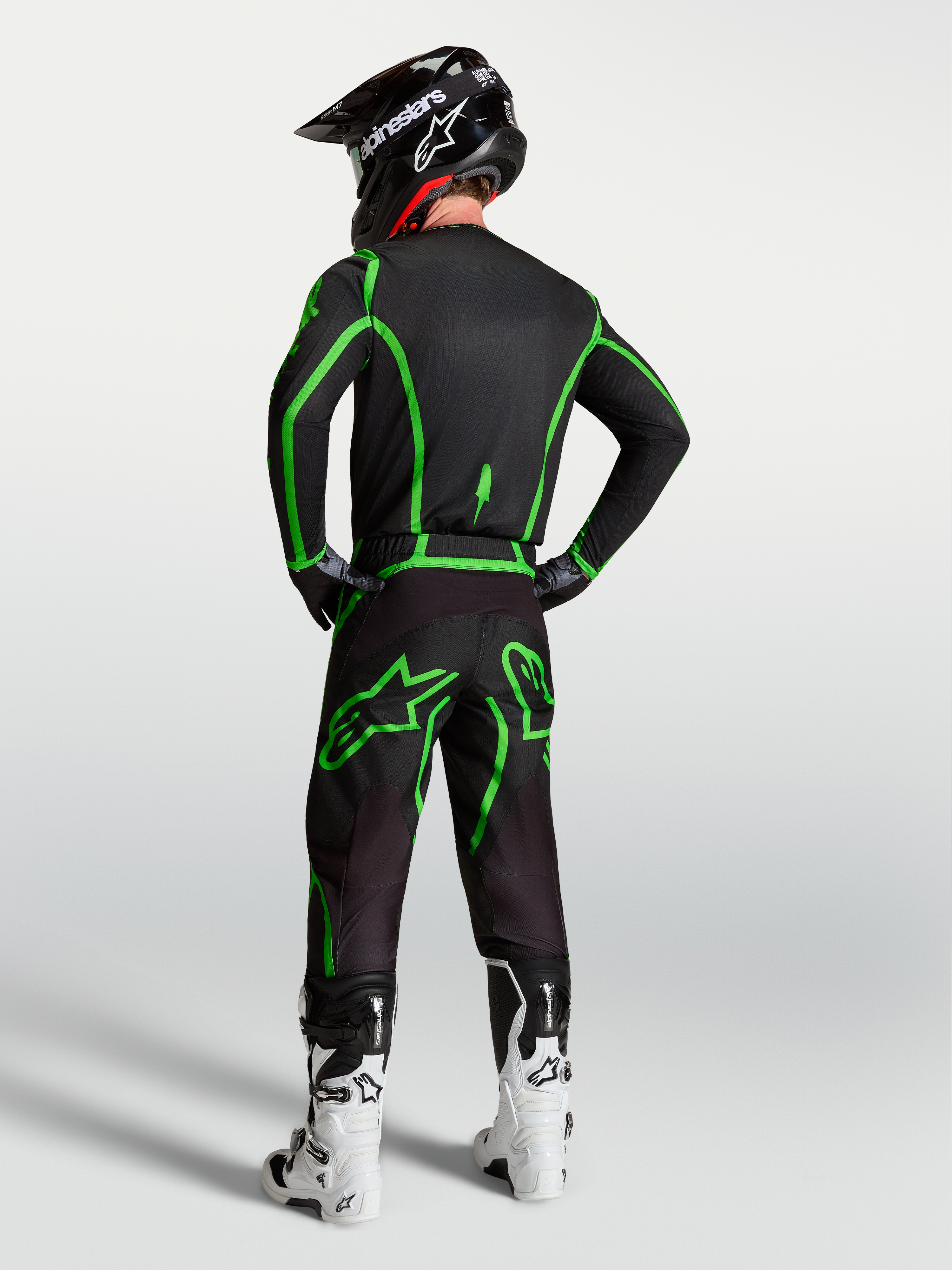 Alpinestars Fluid Apex V2 Jersey AND Gear Set, Men's Motocross Outfit, Black and Green Fluo, rear view on model.