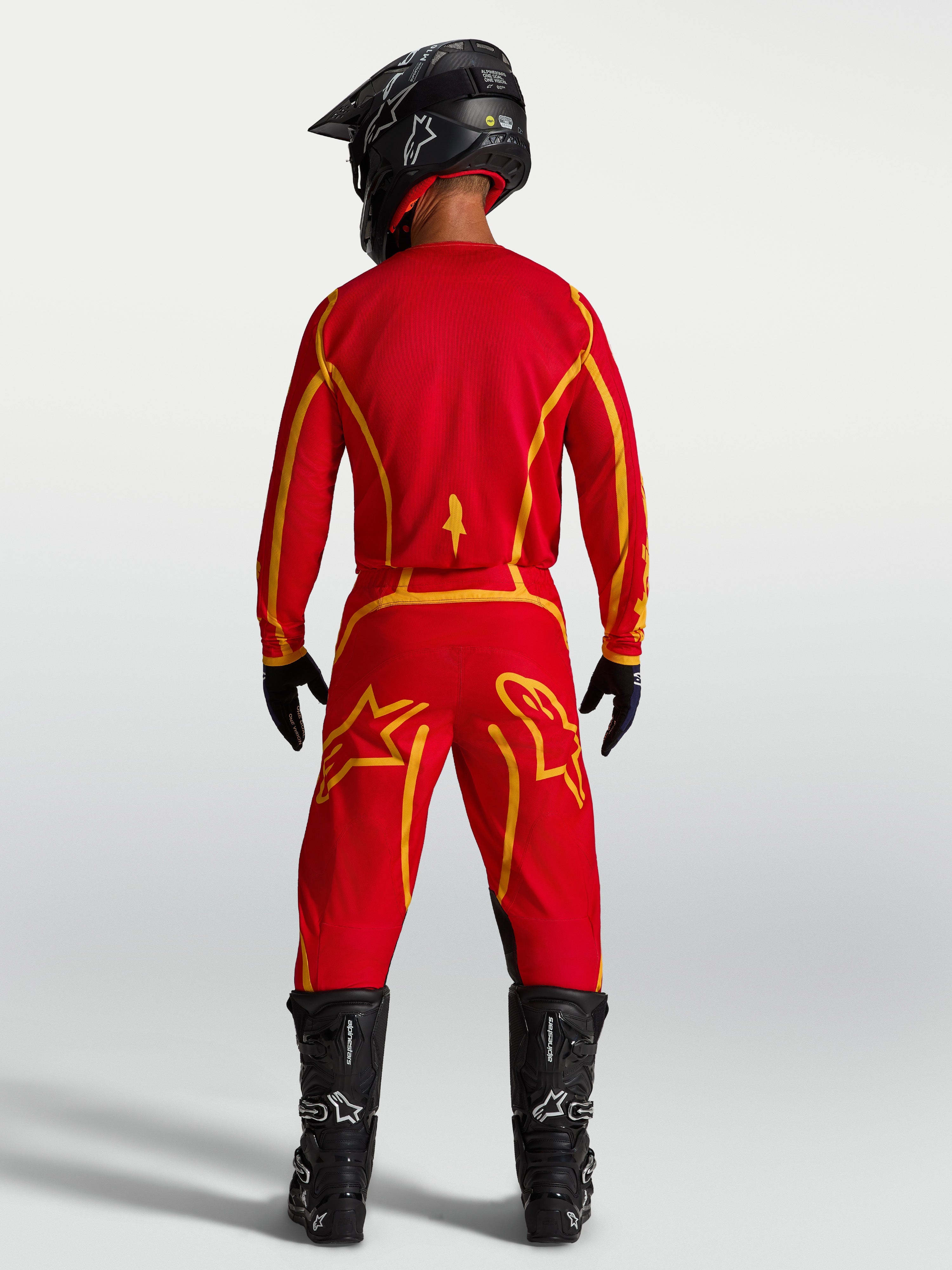 Alpinestars Fluid Apex V2 Trikot, Herren-Motocross-Trikot, Rot und Gold, leichtes feuchtigkeitsableitendes Polygewebe.