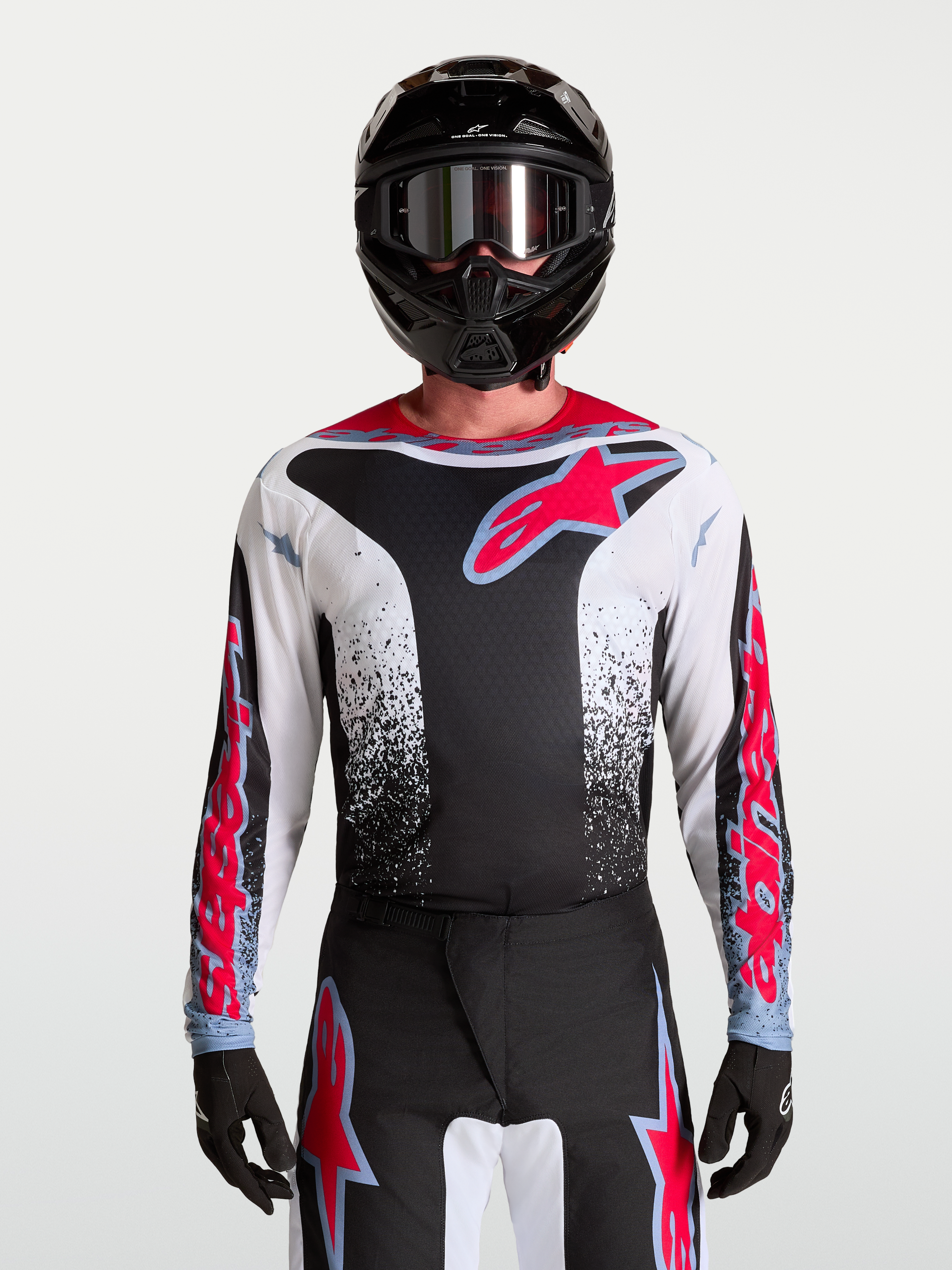 Alpinestars Fluid Drag Trikot, Herren-Motocross-Trikot in Schwarz und Weiß mit roten Akzenten und aggressiven Grafiken.