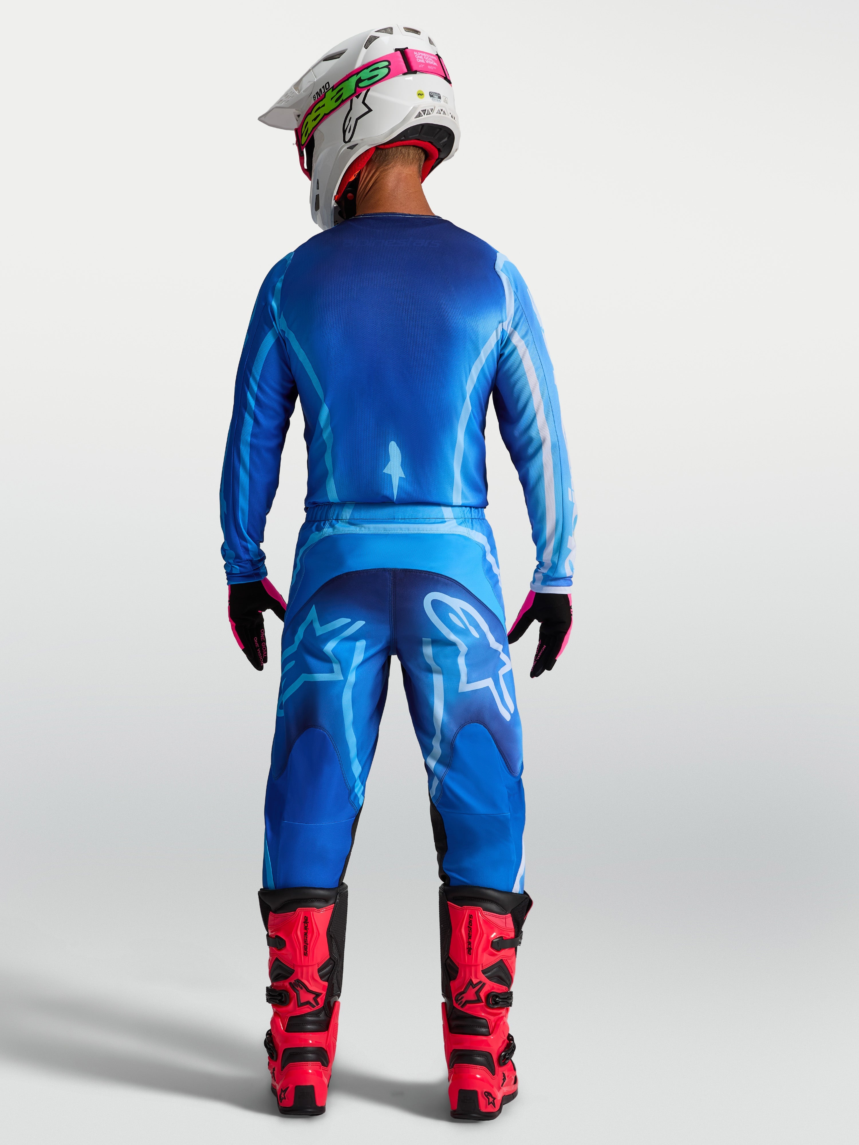 Alpinestars Fluid Kepler Trikot, blaue Herren-Motocross-Ausrüstung, Rückansicht, atmungsaktiv mit verlängertem Rückensaum.