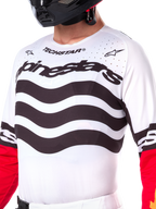 Alpinestars Limited Edition Techstar Deep Trikot, Motocross-Trikot, Schwarz, Weiß und High Red, athletische Rennpassform mit technischen Stretch-Einsätzen, auffälliges Branding und lasergeschnittene Belüftung für Offroad-Performance